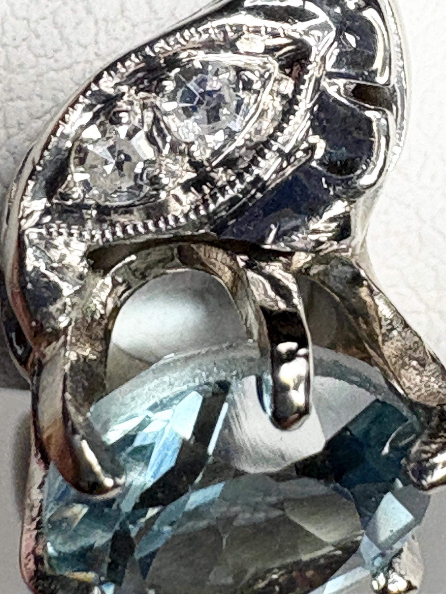 Vintage 14k white gold ring with blue topaz and diamonds.