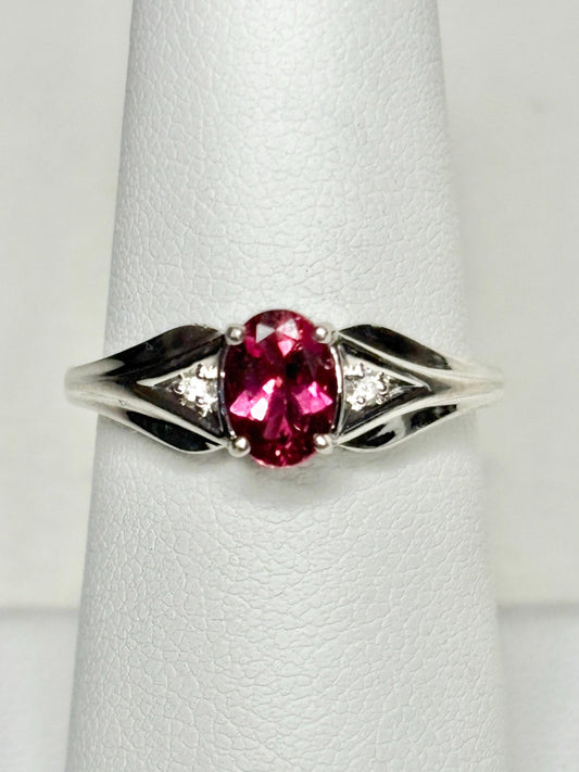 Oval rubellite tourmaline and diamond ring in 10k white gold.