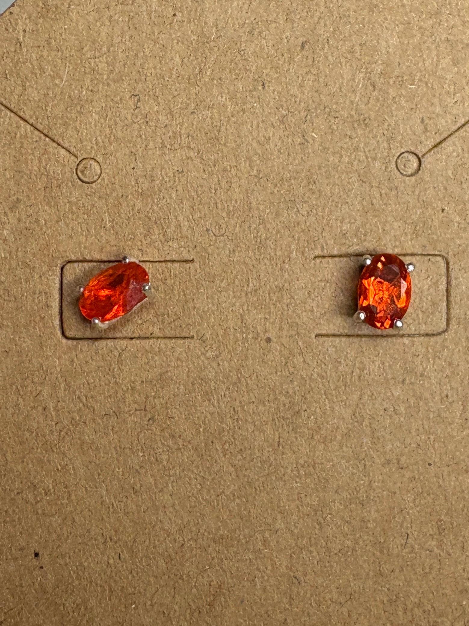 Sterling silver stud earrings with 6x4mm oval Mexican fire opals.