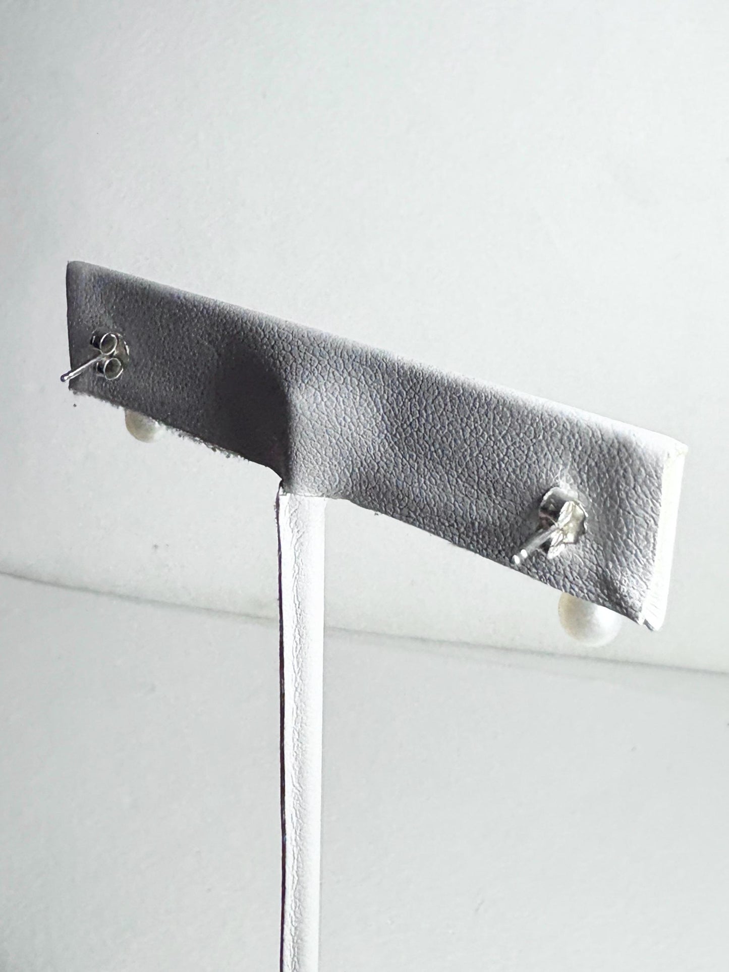 Sterling silver dangle drop earrings with vintage freshwater pearls.