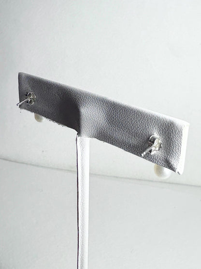 Sterling silver dangle drop earrings with vintage freshwater pearls.