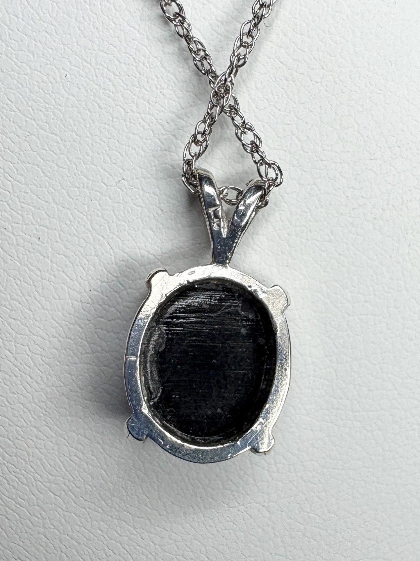Sterling silver pendant necklace with a black triplet opal solitaire.