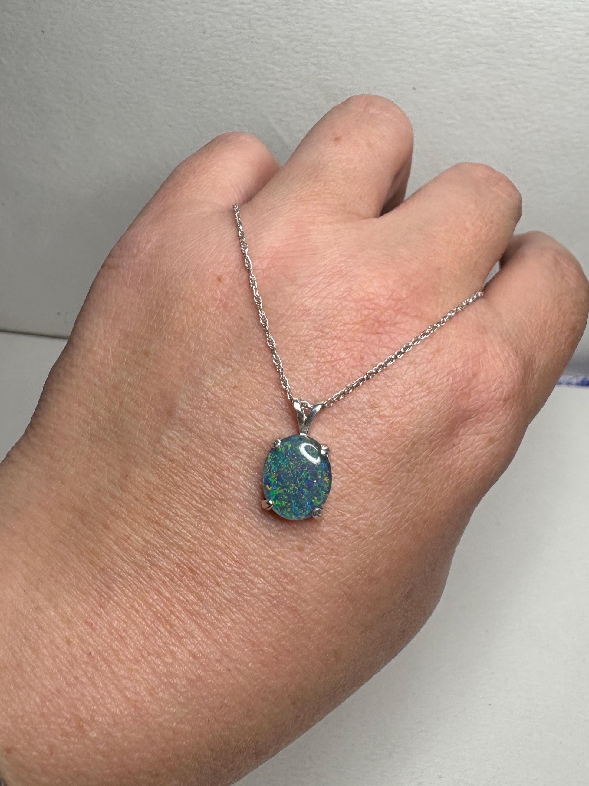 Sterling silver pendant necklace with an oval Australian opal triplet.