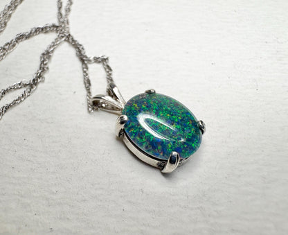 Sterling silver pendant necklace with an oval Australian opal triplet.
