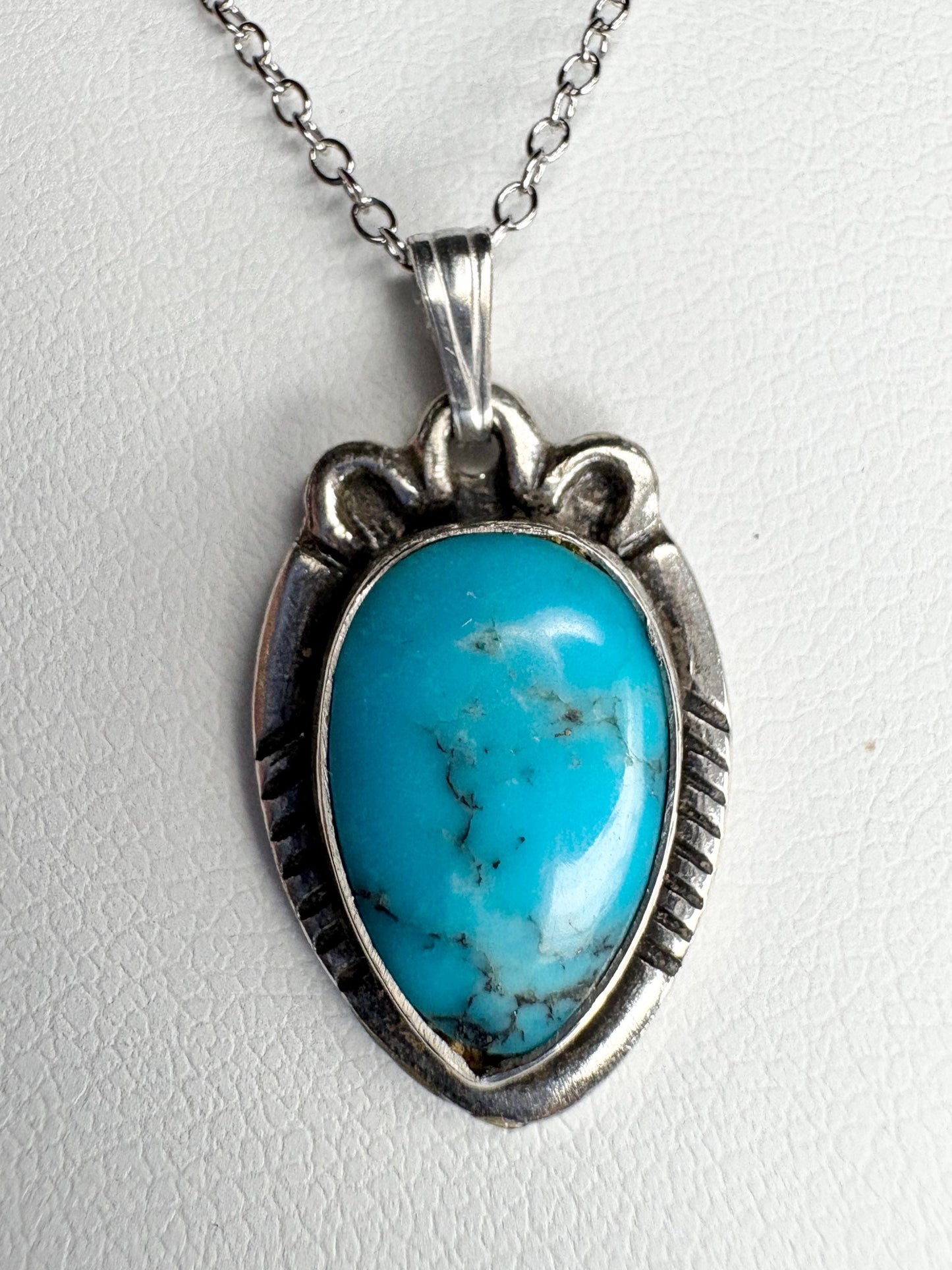 Vintage Southwest style turquoise pendant necklace with adjustable chain.