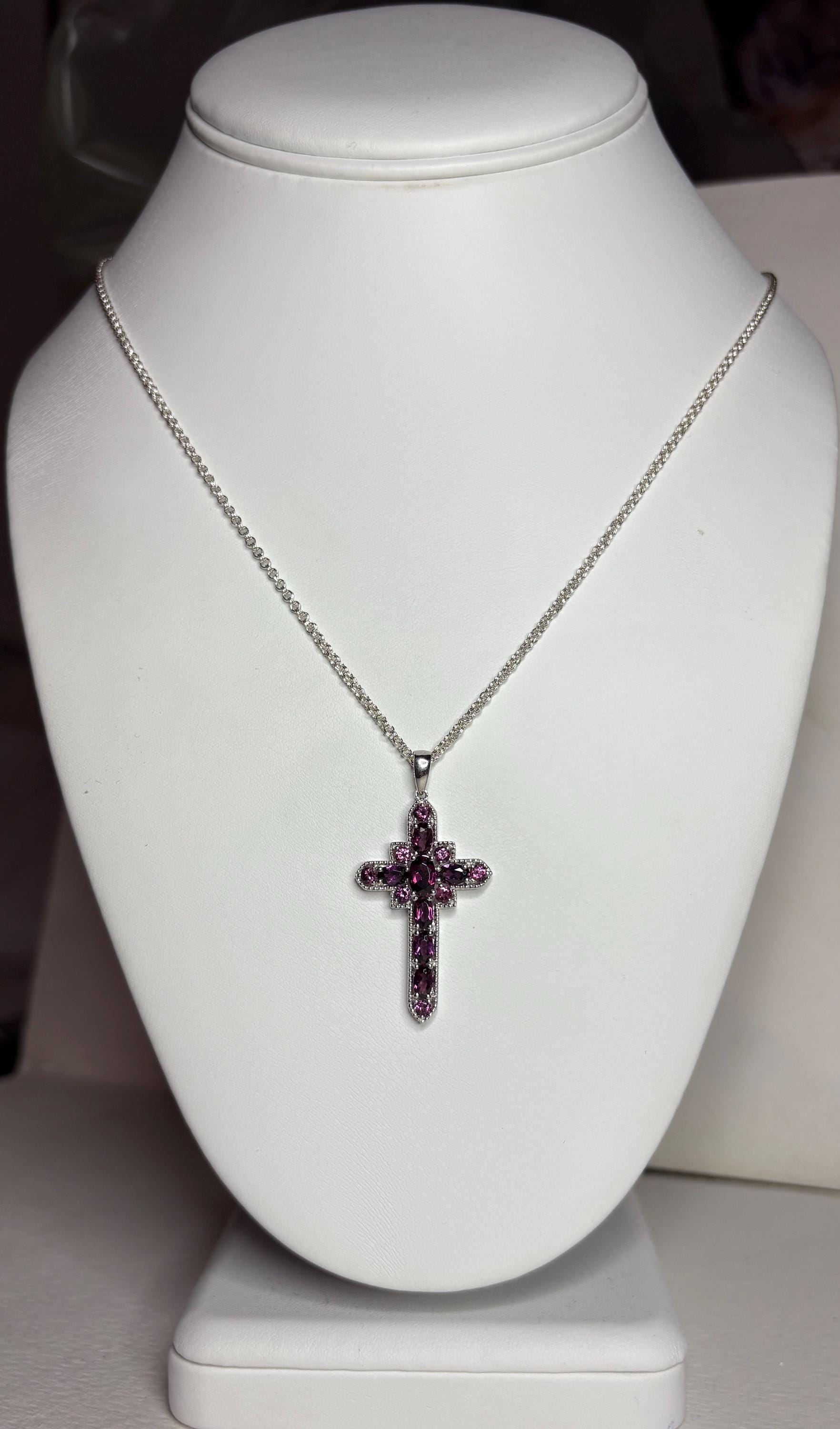 Sterling silver cross pendant necklace with rhodolite garnets.