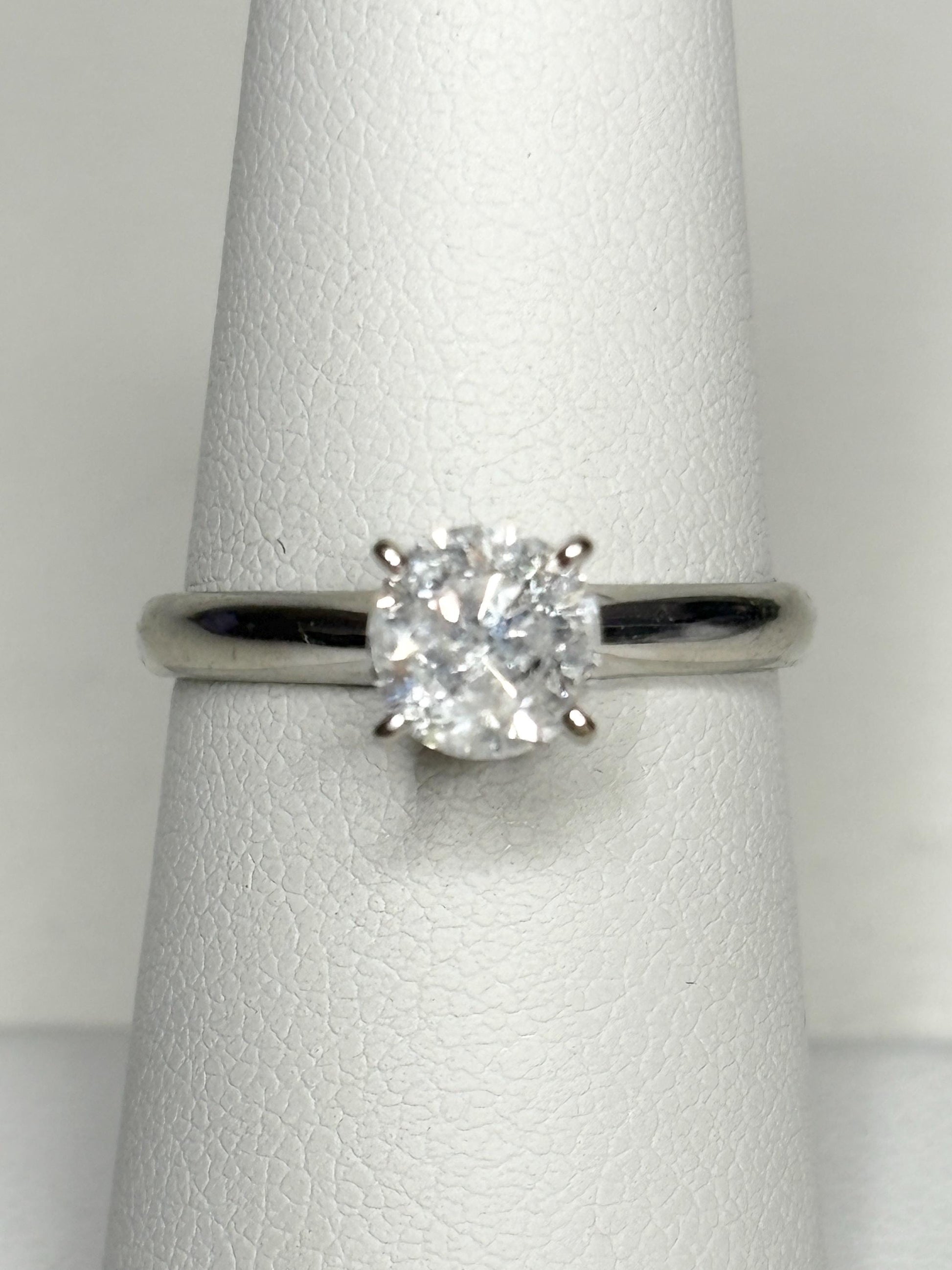 A 1ct round diamond solitaire ring in 10k white gold.