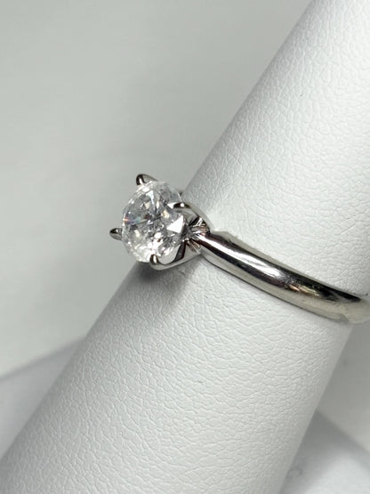 A 1ct round diamond solitaire ring in 10k white gold.