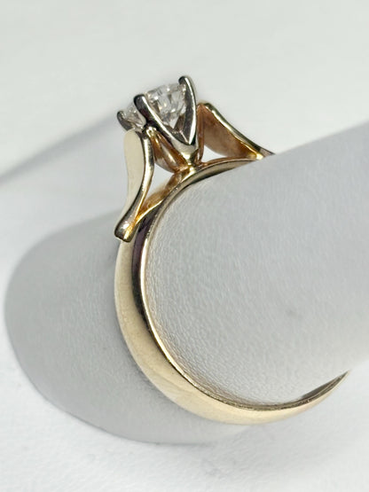 Vintage 14k gold band ring with a .75ct diamond.
