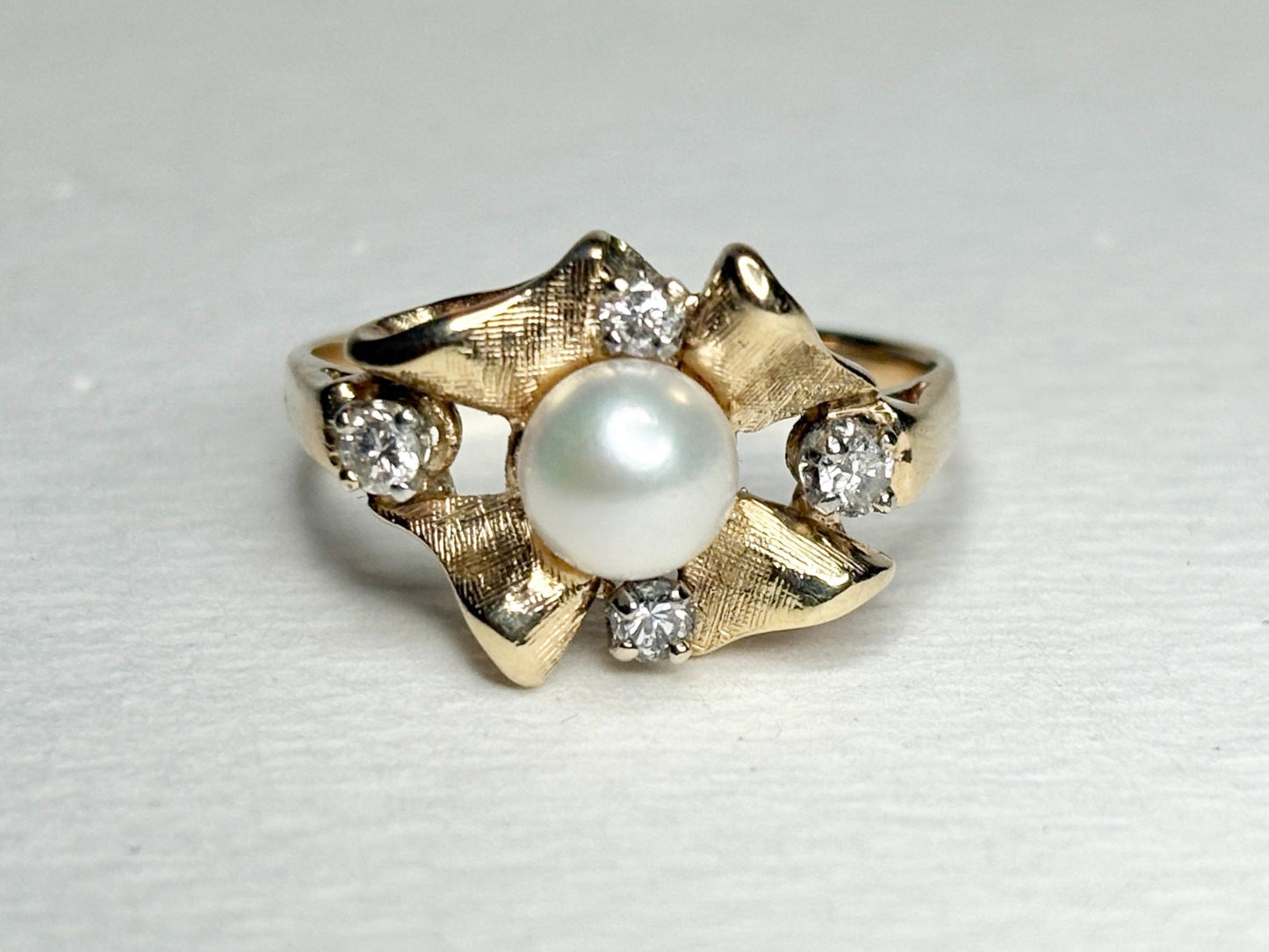 14k gold ring with Akoya pearl and diamonds.