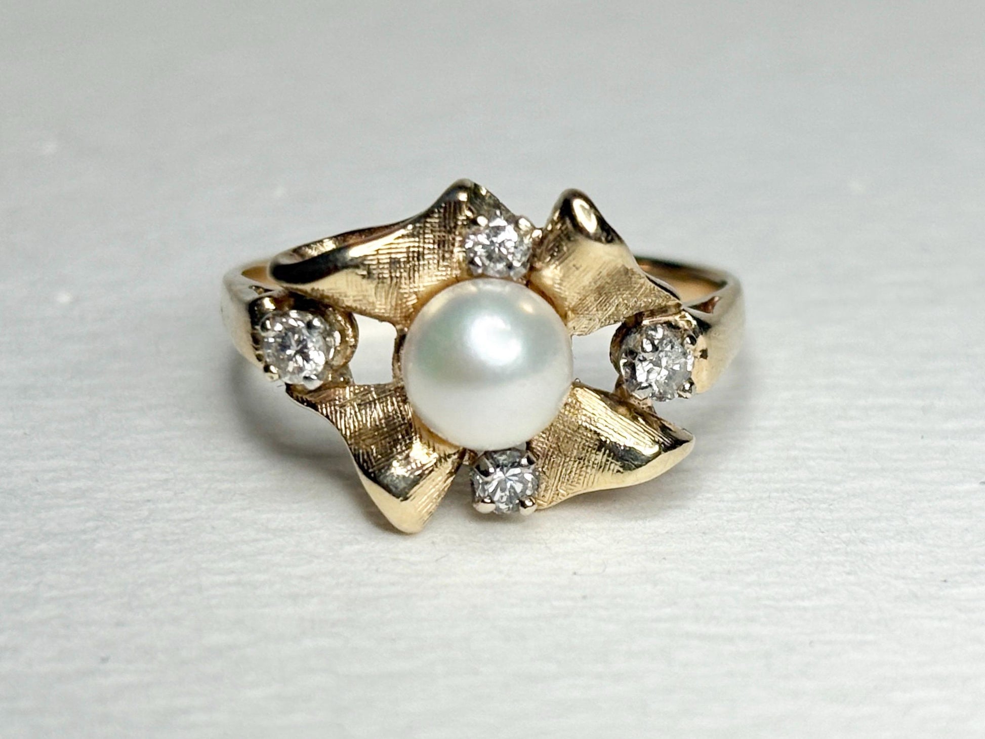 14k gold ring with Akoya pearl and diamonds.