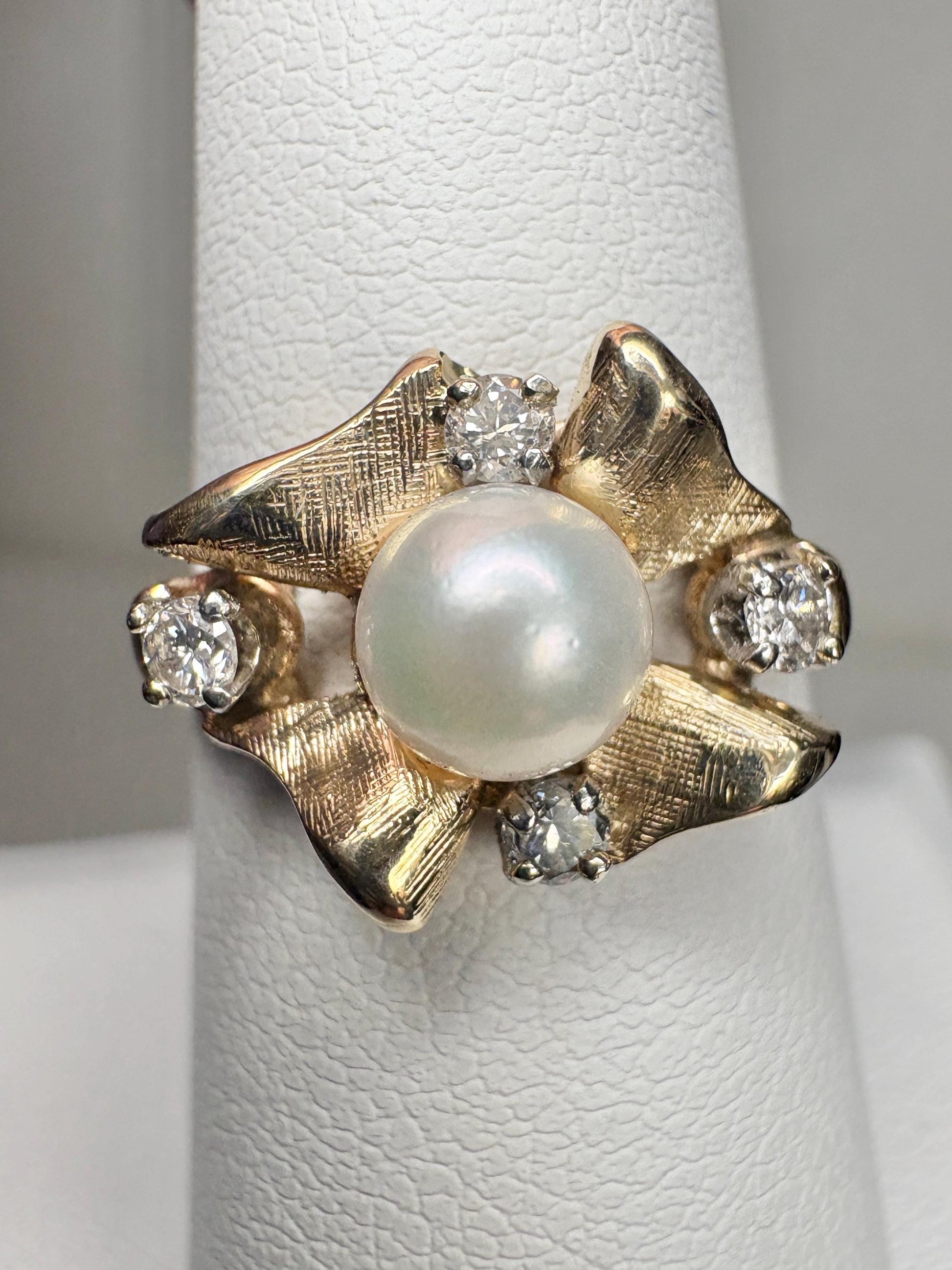 Mid Century 14k gold ring with Akoya pearl and diamonds.
