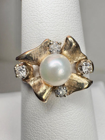 Mid Century 14k gold ring with Akoya pearl and diamonds.