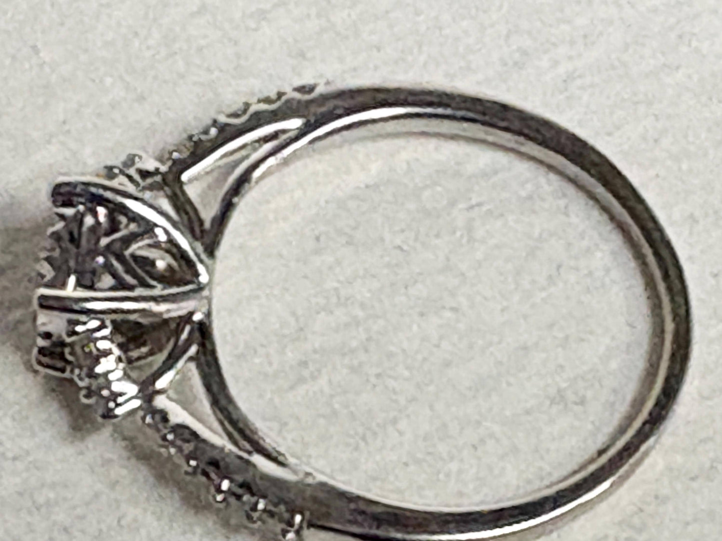 Squared diamond halo cluster ring in solid 14k white gold.