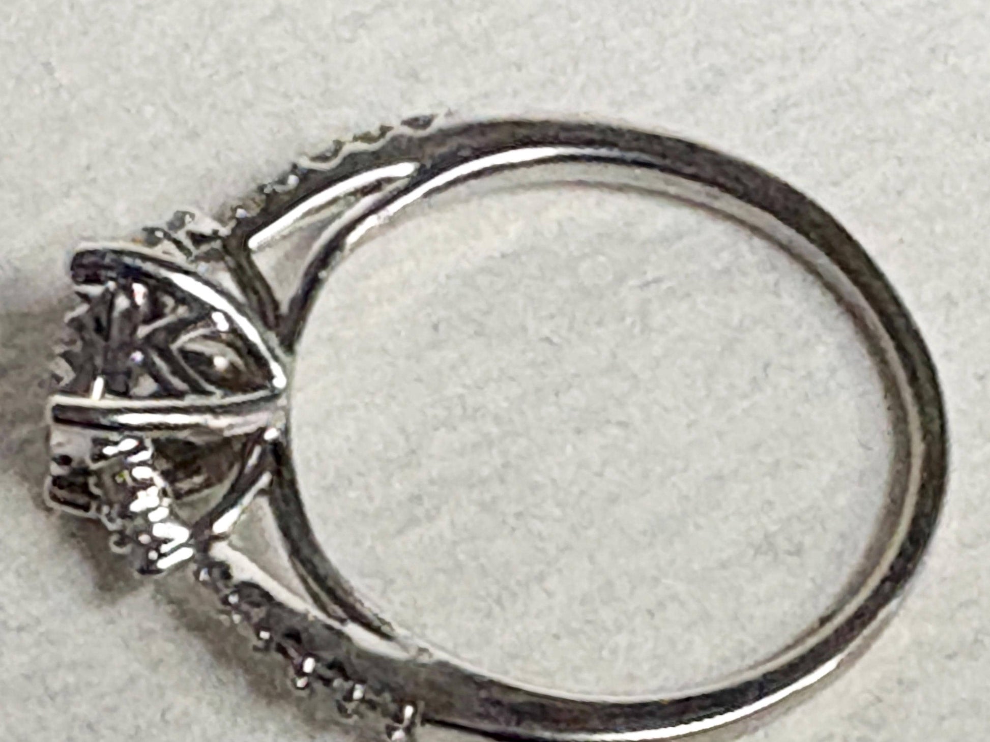 Squared diamond halo cluster ring in solid 14k white gold.