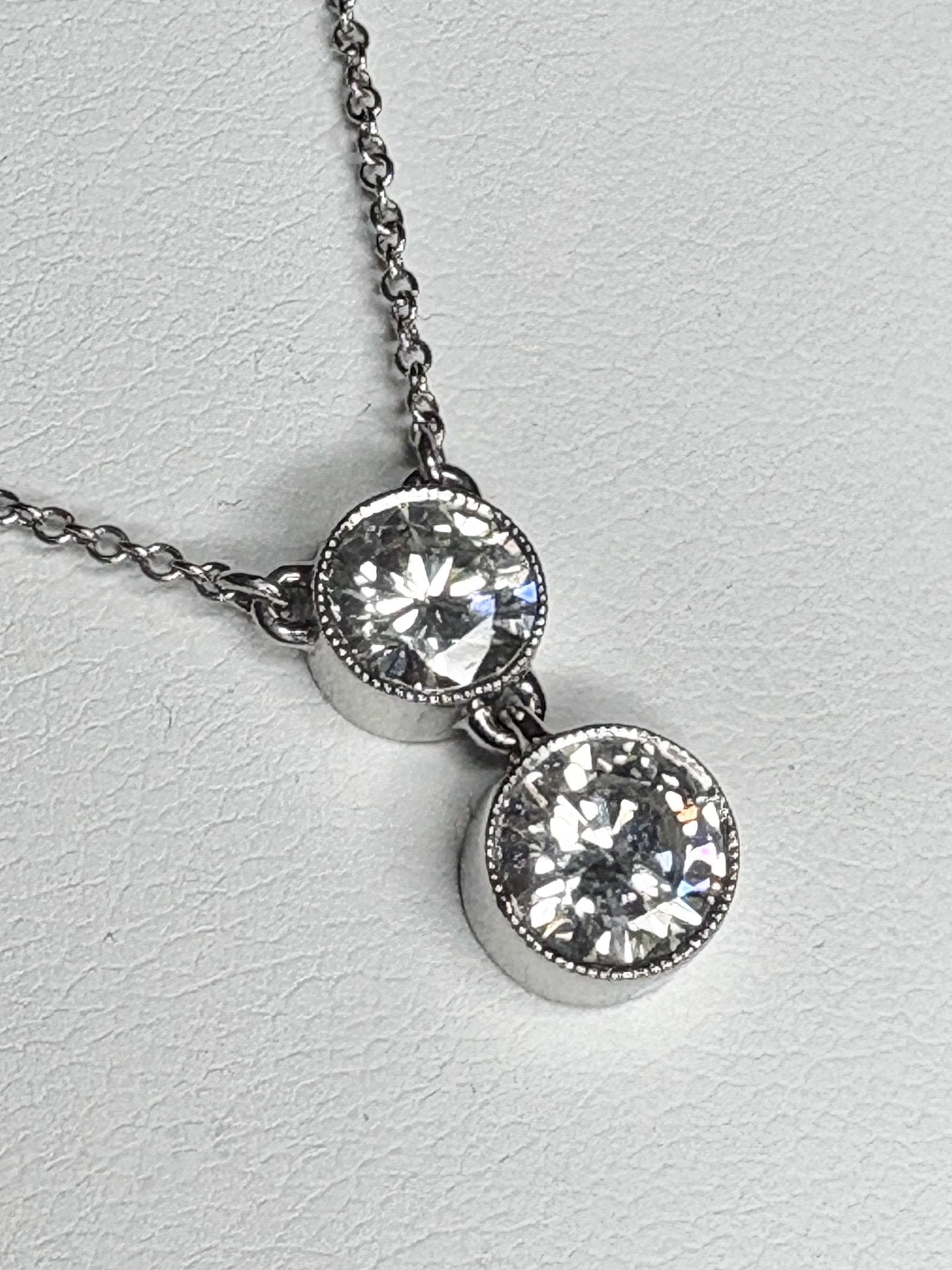 Custom double solitaire natural diamond necklace in solid 14k white gold.