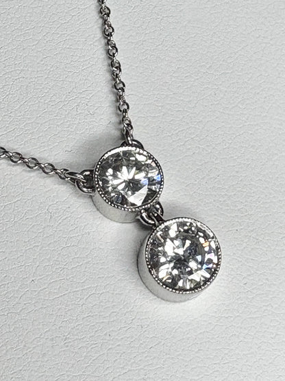 Custom double solitaire natural diamond necklace in solid 14k white gold.