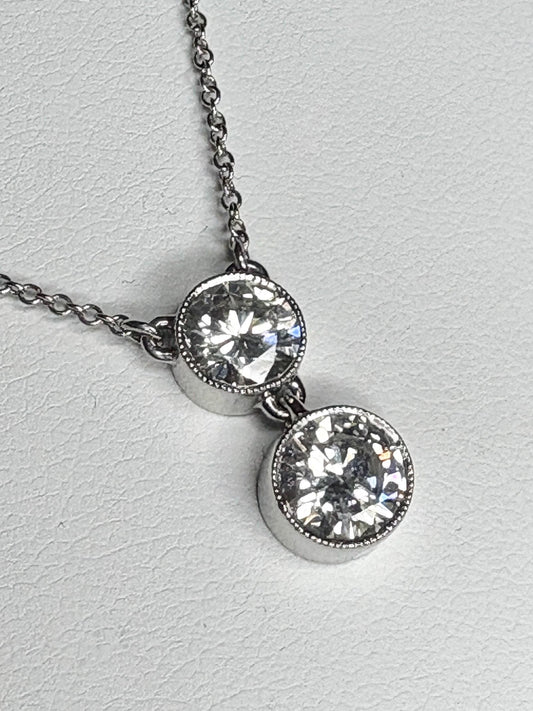 Custom double solitaire natural diamond necklace in solid 14k white gold.