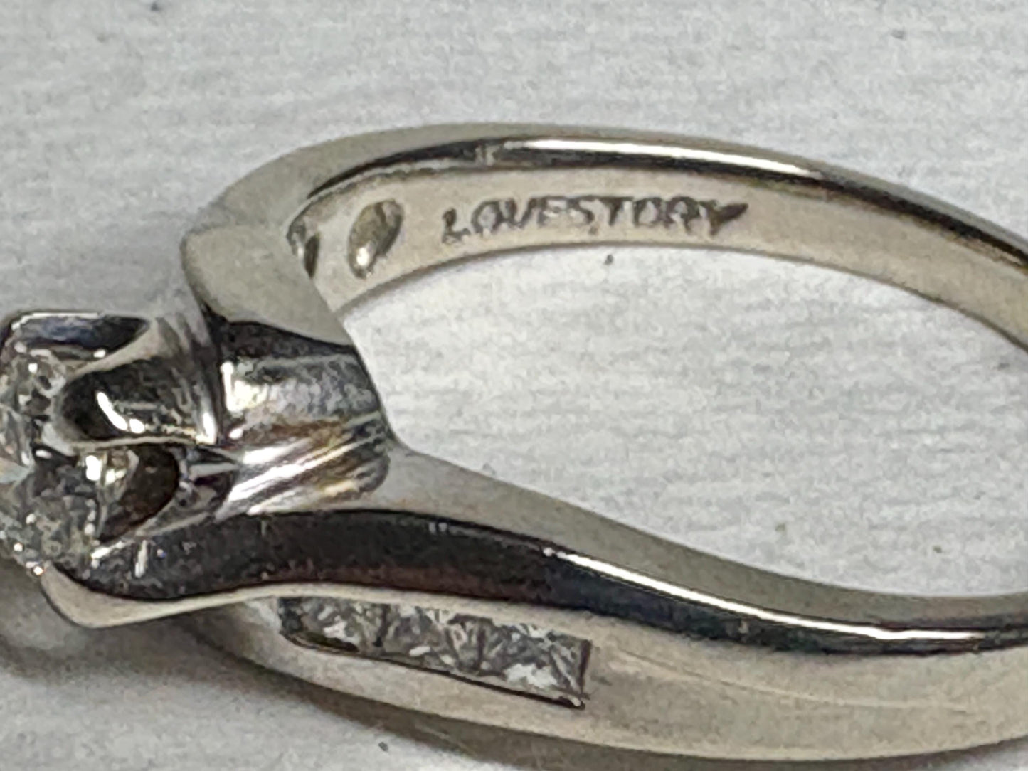 Love Story 14k white gold ring with diamonds.