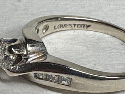 Love Story 14k white gold ring with diamonds.