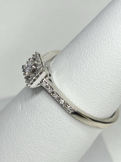 Princess cut diamond halo ring in 10k white gold.