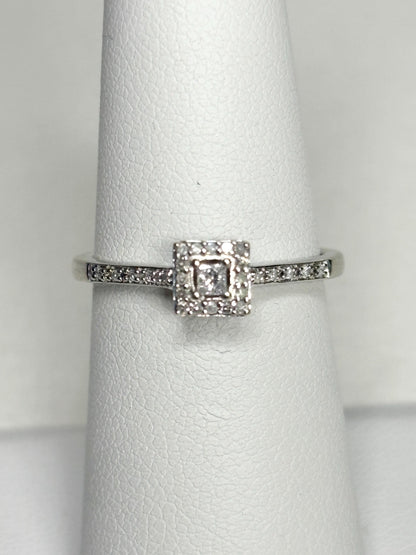 Princess cut diamond halo ring in 10k white gold.