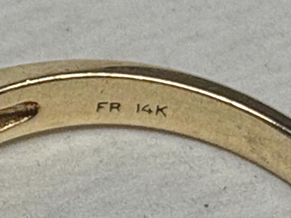 Ring with "FR 14K" inscription.