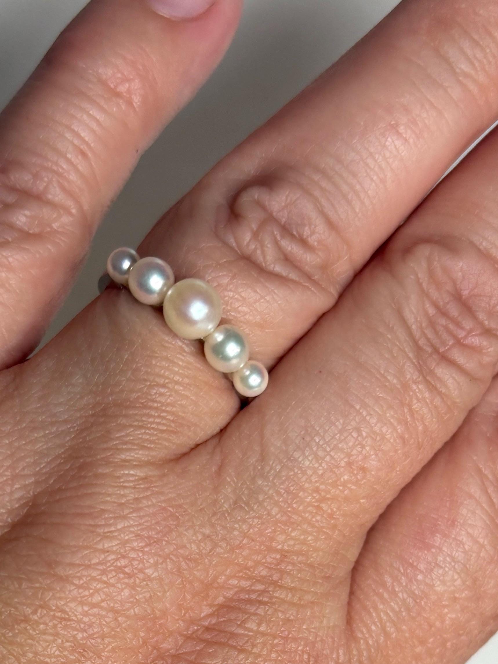 18k white gold ring with five Akoya cultured pearls.