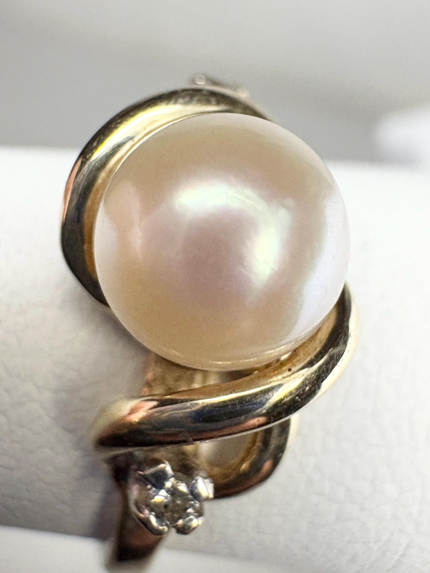 Akoya pearl and diamond ring in solid 10k gold.