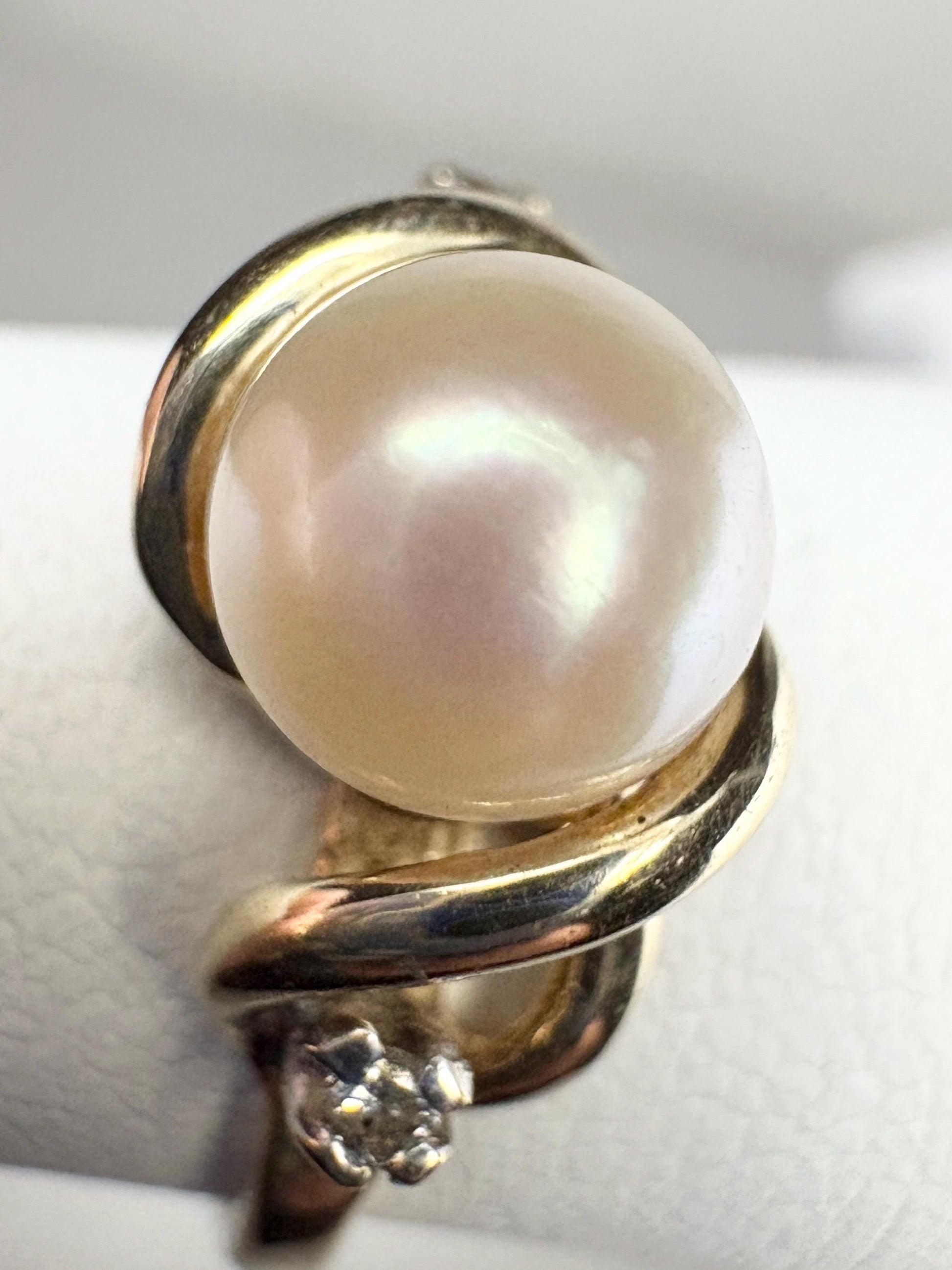 Akoya pearl and diamond ring in solid 10k gold.