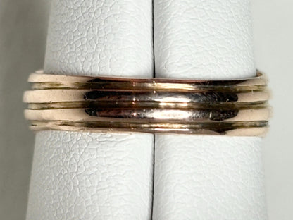 Vintage 10k rose gold wide band ring with an old mine cut diamond.