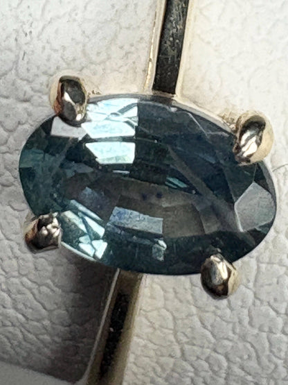 Oval Montana sapphire solitaire ring in solid 10k gold.