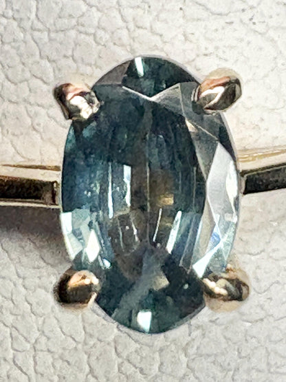 Oval Montana sapphire solitaire ring in solid 10k gold.