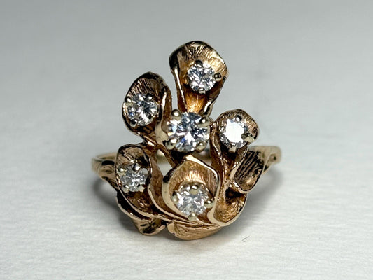 Mid Century 14k gold ring with cascading floral design and .75ctw diamonds.