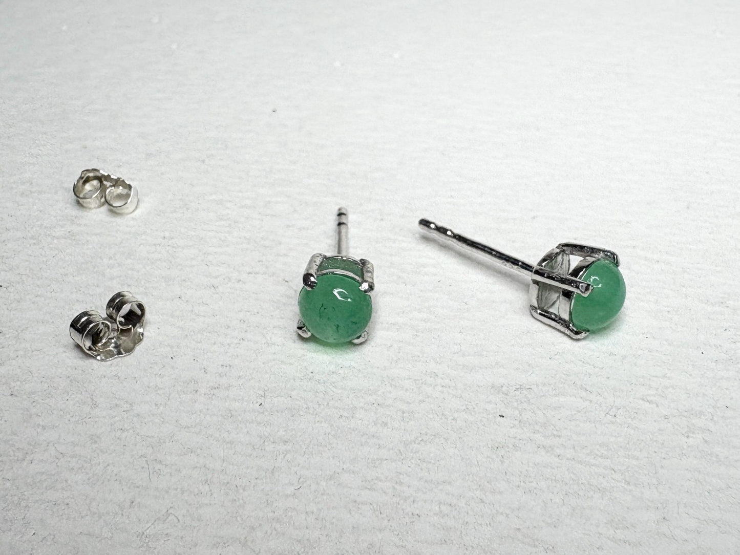 Sterling silver stud earrings with 5mm Australian chrysoprase cabochons.