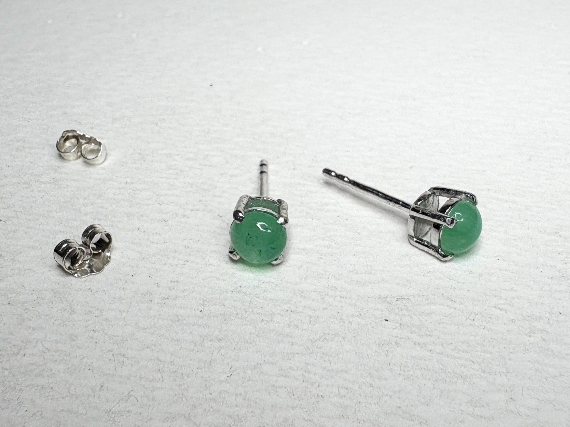 Sterling silver stud earrings with 5mm Australian chrysoprase cabochons.