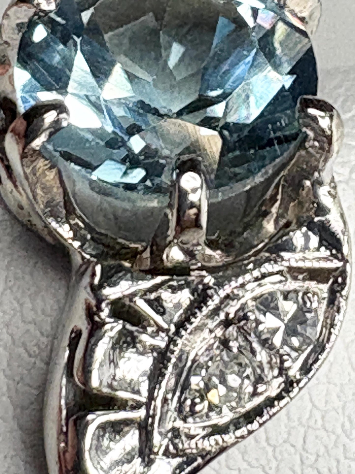 Vintage 14k white gold ring with blue topaz and diamonds.