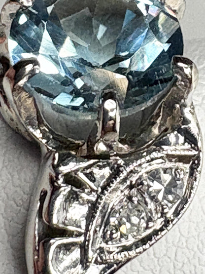 Vintage 14k white gold ring with blue topaz and diamonds.