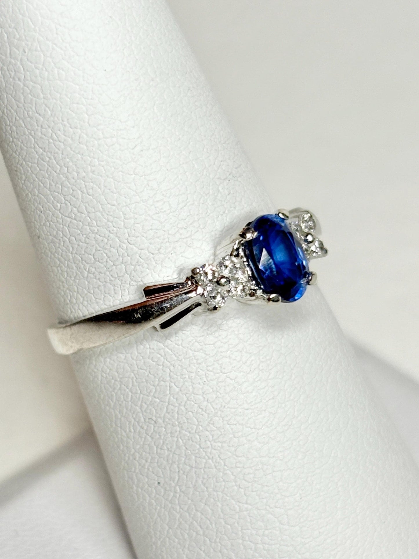 Oval kyanite and diamond ring in 10k white gold.