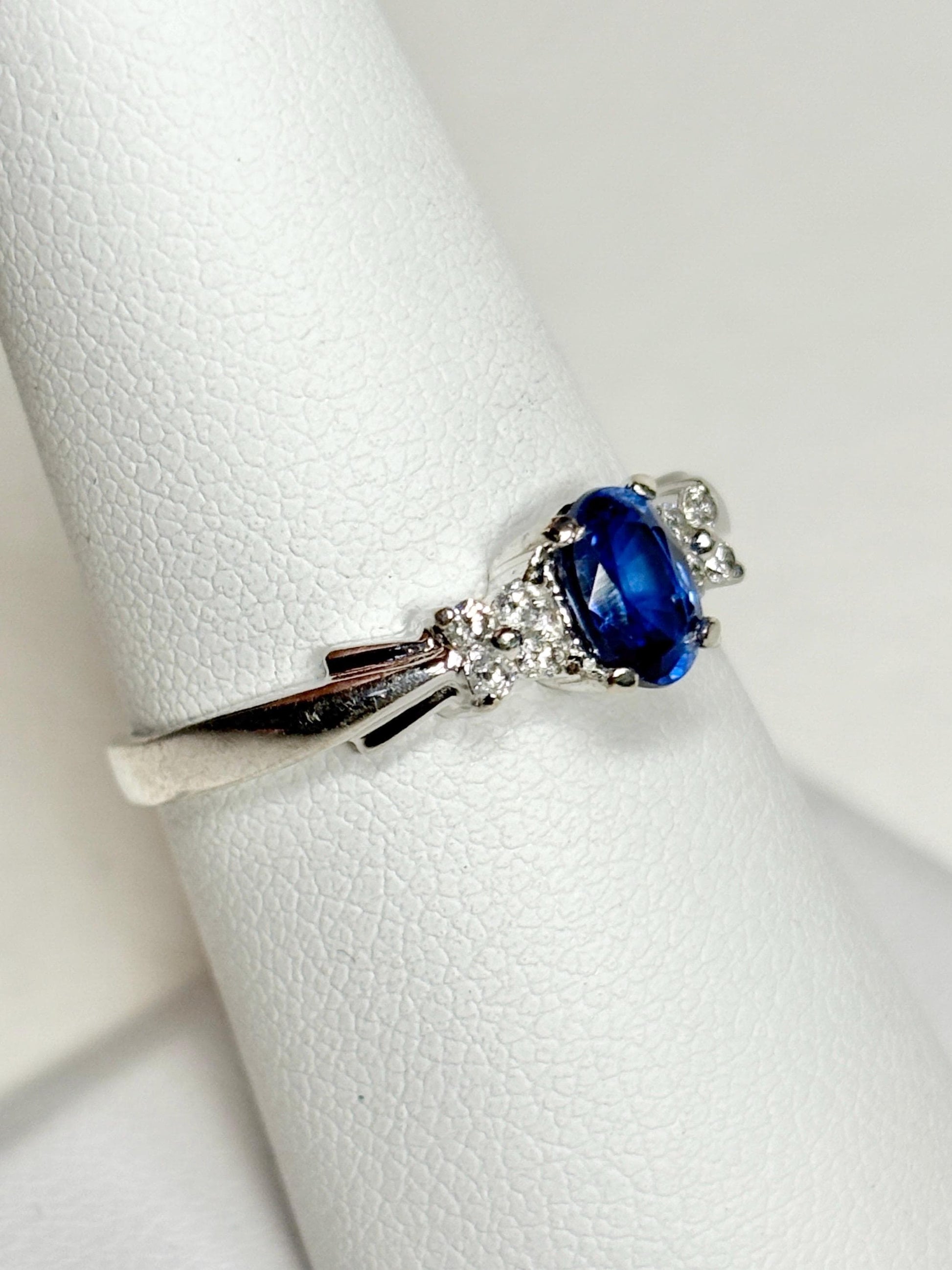 Oval kyanite and diamond ring in 10k white gold.