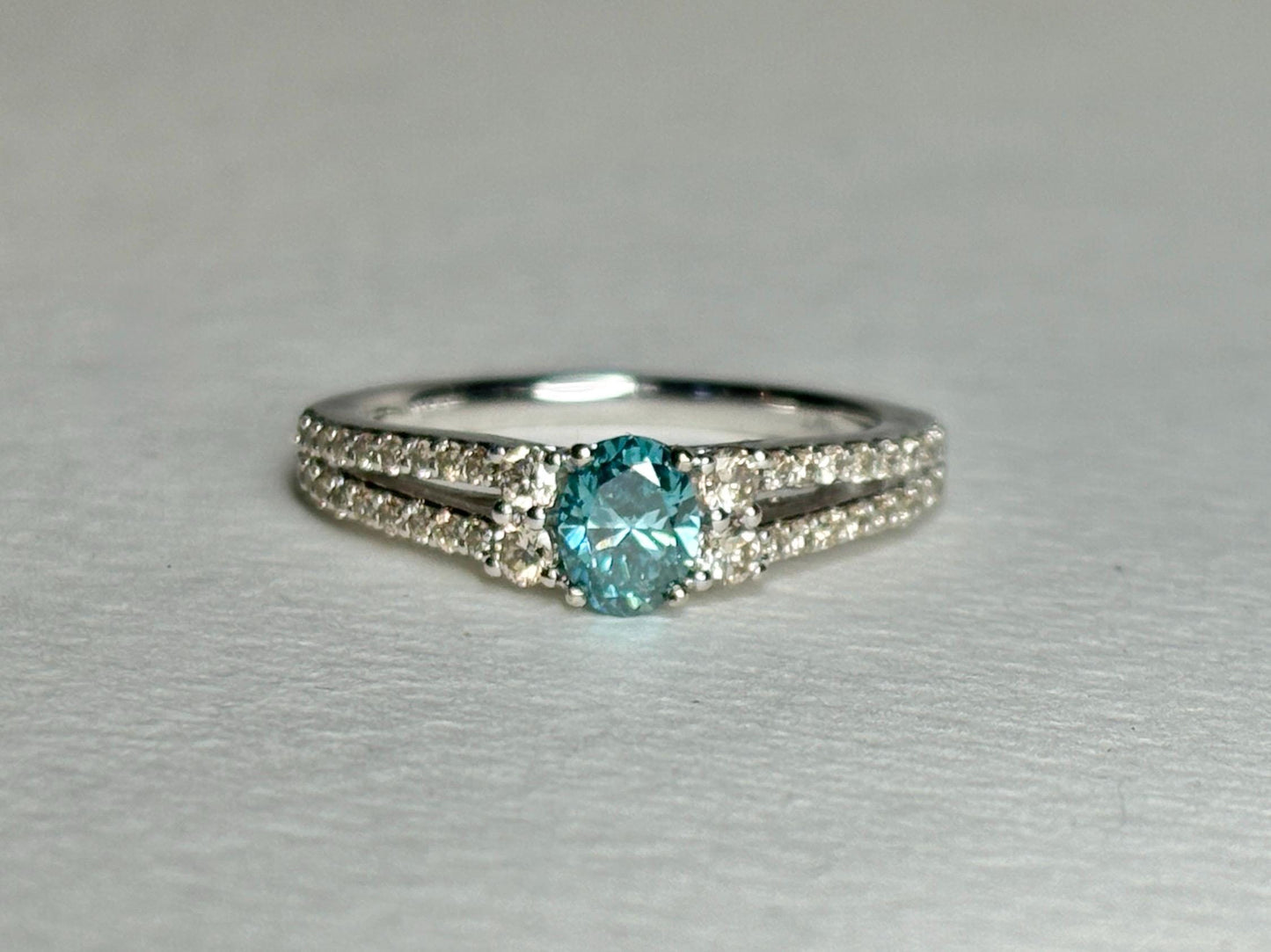 LeVian 14k white gold ring with a blue diamond and champagne diamonds.