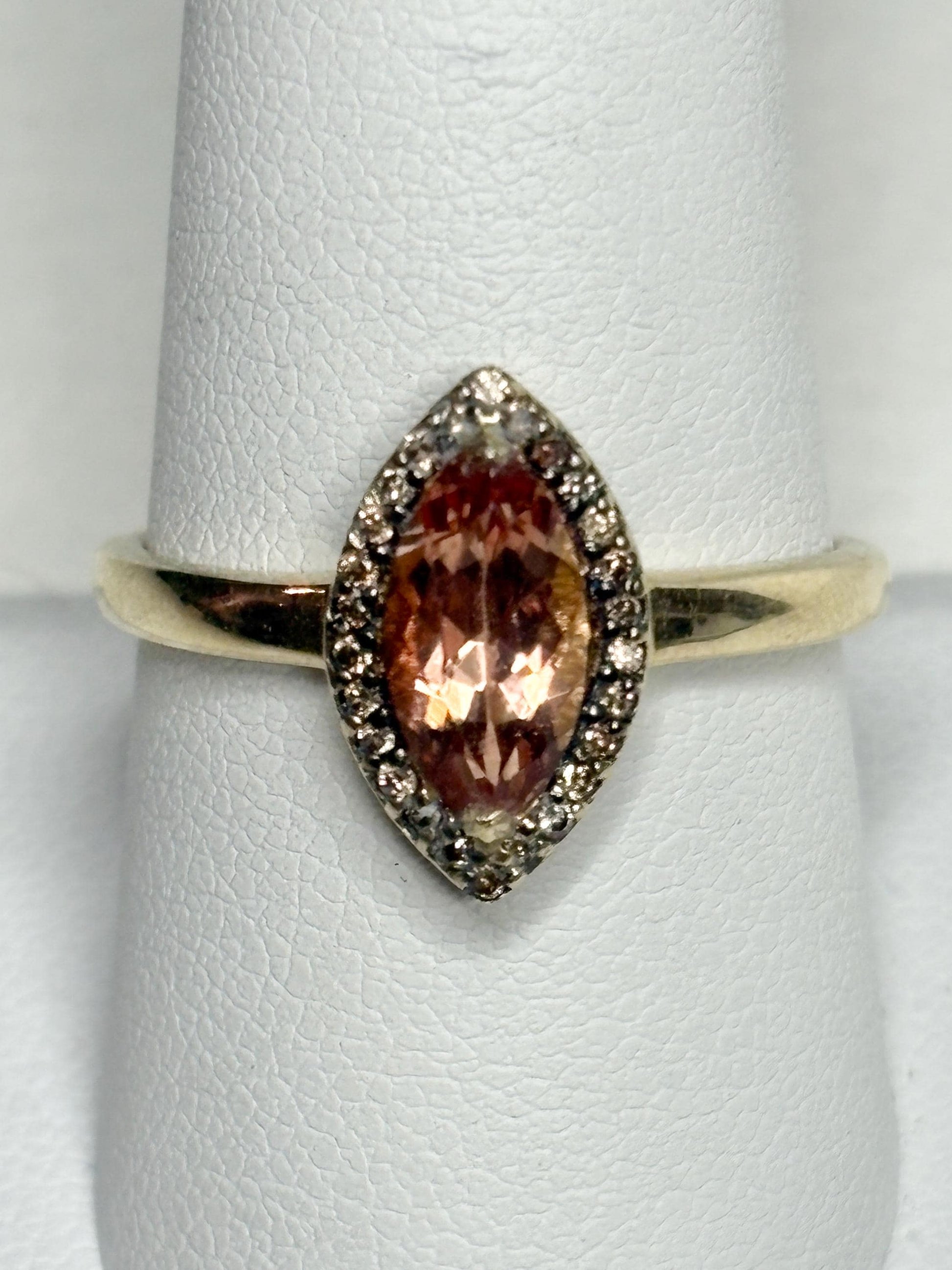 Marquise Oregon sunstone ring with champagne diamonds in 10k gold.