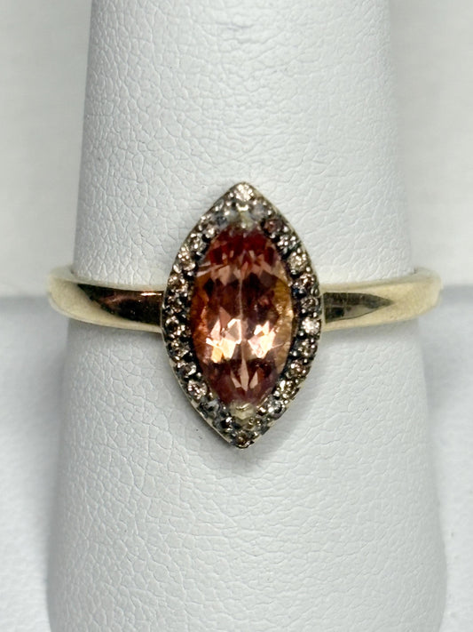 Marquise Oregon sunstone ring with champagne diamonds in 10k gold.