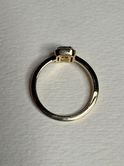 Effy 14k yellow gold ring with a bezel-set baguette diamond and diamond halo.