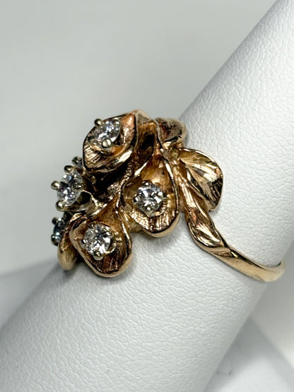 Mid Century 14k gold ring with cascading floral lilies and .75ctw diamonds.
