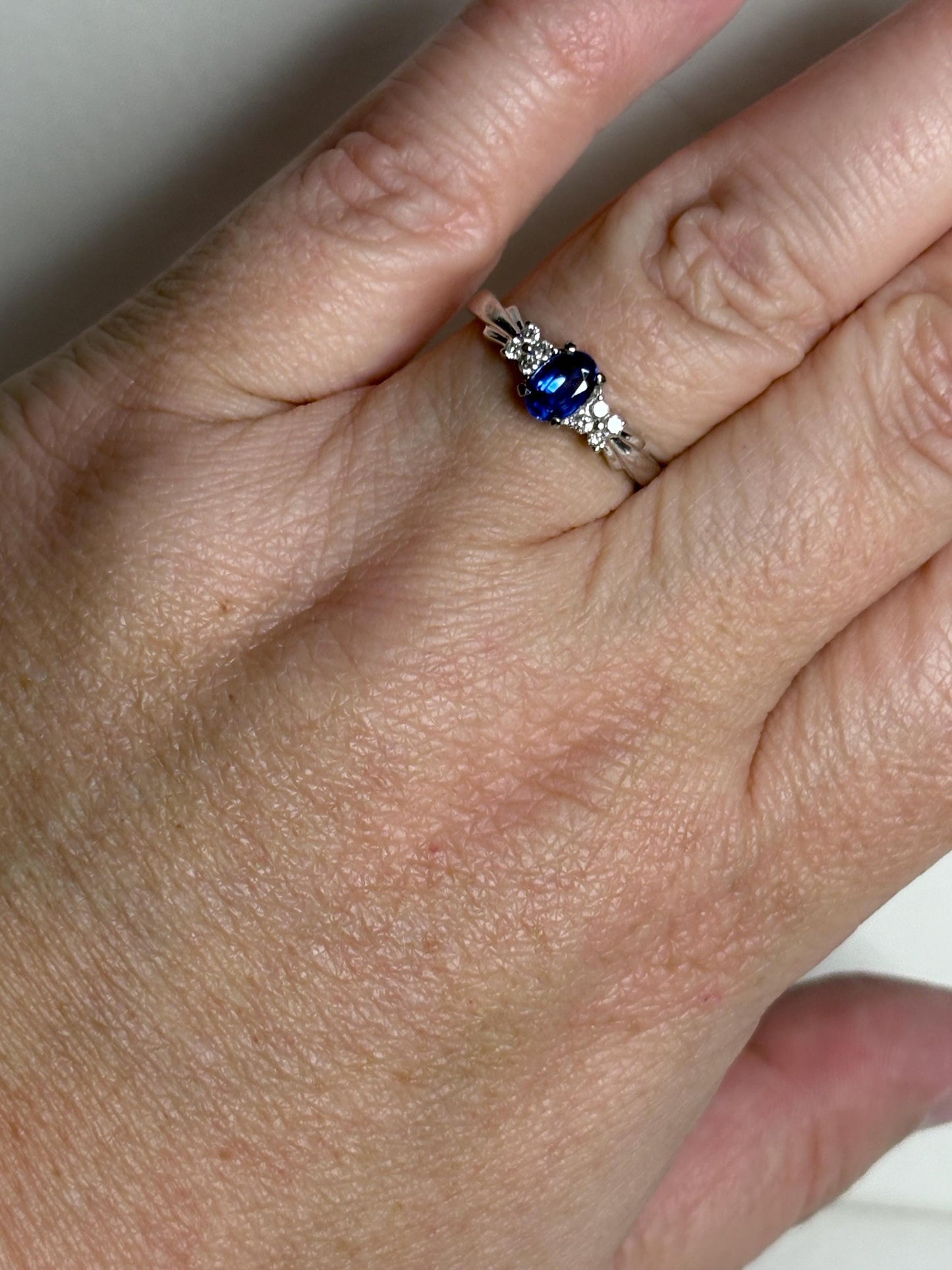 Oval kyanite and diamond ring in 10k white gold.
