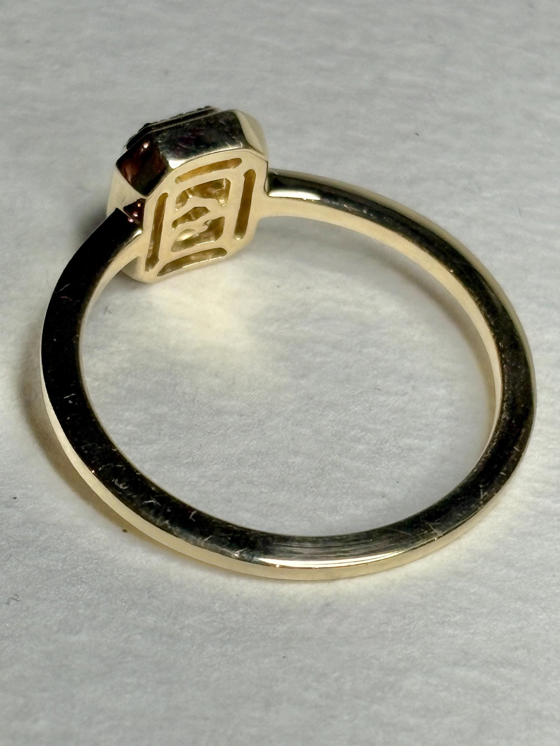 Effy 14k gold ring with a bezel-set baguette diamond and diamond halo.