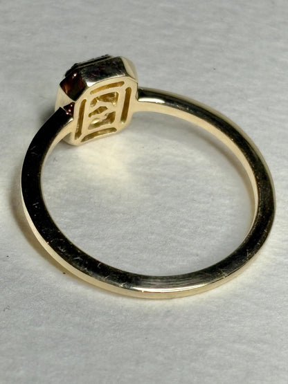 Effy 14k gold ring with a bezel-set baguette diamond and diamond halo.