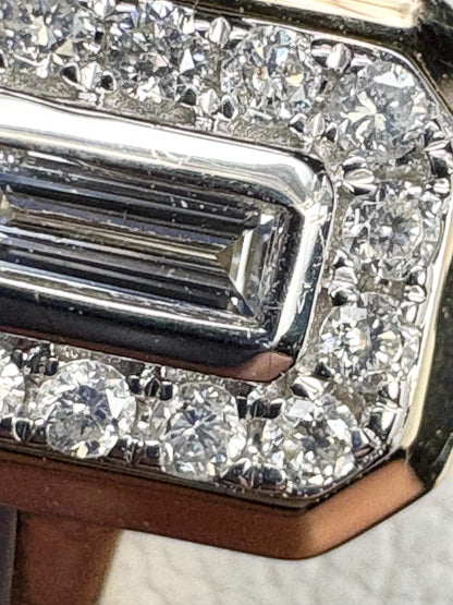 Effy 14k gold ring with a bezel-set baguette diamond surrounded by smaller diamonds.
