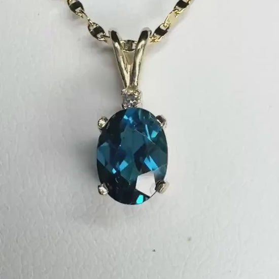 Beautiful Vibrant London Blue Topaz AAAA with a Diamond Accent Pendant Necklace in 14k Gold 18"